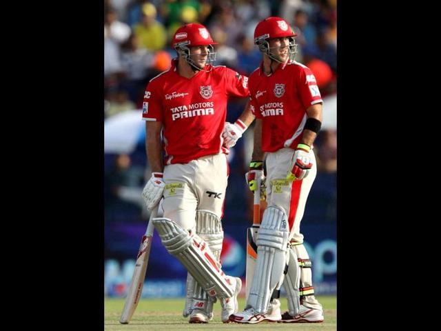 David Miller and Glenn Maxwell of Kings XI Punjab in action during their IPL 7 match against Chennai Super Kings at the Al Zayed Cricket Stadium, Abu Dhabi. (PTI Photo)