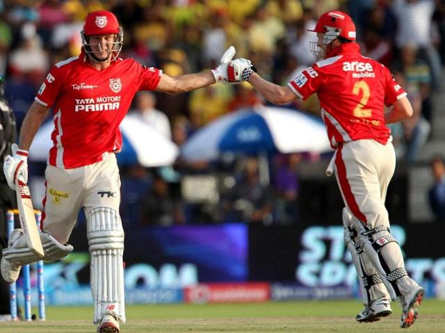 George Bailey of Kings XI Punjab celebrates the win with David Miller during their IPL 7 match against Chennai Super Kings at the Al Zayed Cricket Stadium, Abu Dhabi. (PTI Photo)