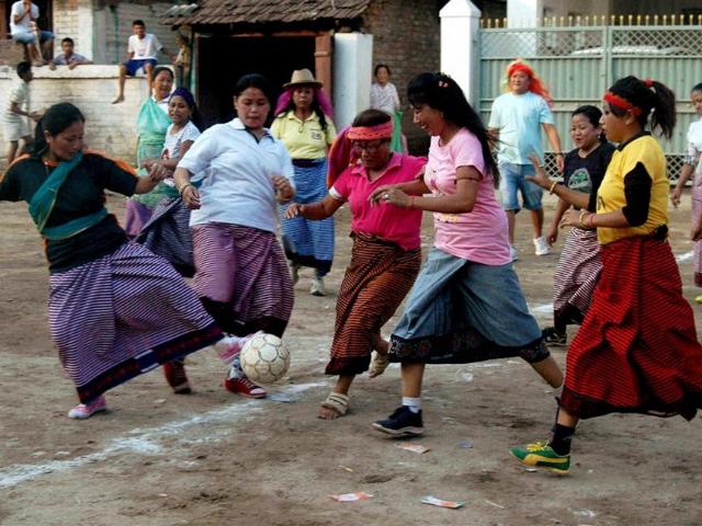 Manipuri women play a friendship football match on their New Year "Cheiraoba" in Guwahati . (PTI photo)