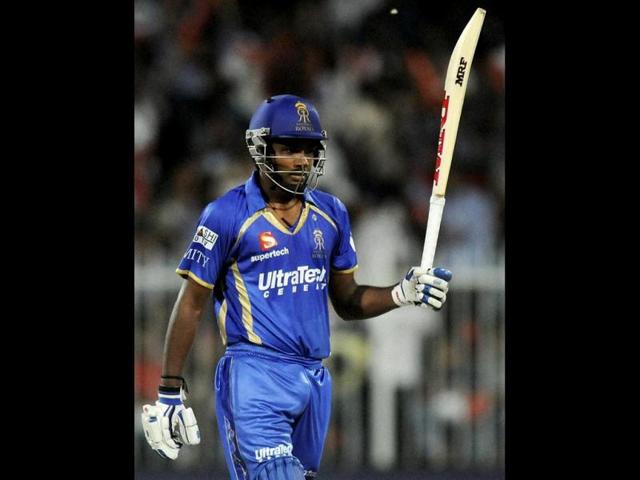 Sanju Samson of Rajatshan Royals raises his bat after scoring a half century during their IPL 7 match against Kings XI Punjab in Sharjah. (PTI Photo)