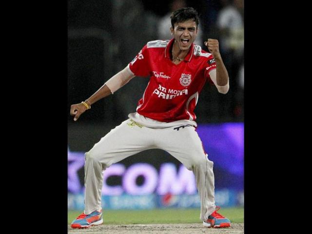 Akshar Patel of Kings X1 Punjab celebrates the wicket of Shane Watson of Rajatshan Royals during their IPL 7 match in Sharjah. (PTI Photo)