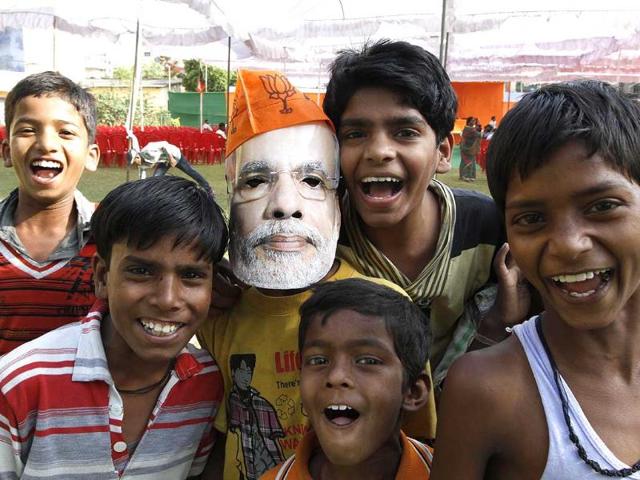 Young supporters of BJP's PM candidate Narendra Modi at Nivedita Sadan School in Tulsipur, Varanasi. (Arvind Yadav/HT photo)