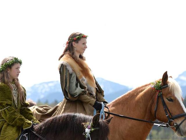 A woman and a girl take part in the traditional St Georgi Ride on Easter Monday in southern Germany. (AFP Photo)