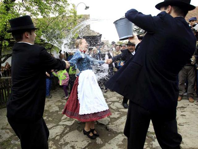 Locals from the World Heritage village of Holloko celebrate Easter with the tradition "watering of the girls", a Hungarian tribal fertility ritual rooted in the area's pre-Christian past. (Reuters Photo)