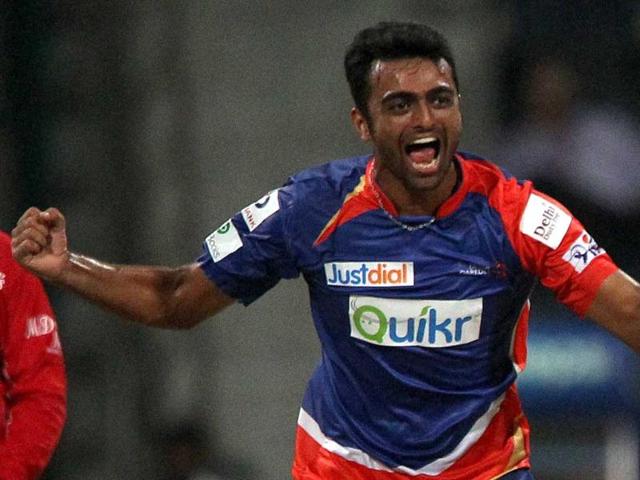 Delhi Daredevils' Jaydev Unadkat celebrates the wicket of Ravindra Jadeja of Chennai Super Kings during their IPL 7 match at the Zayed Cricket Stadium in Sharjah. (PTI Photo)