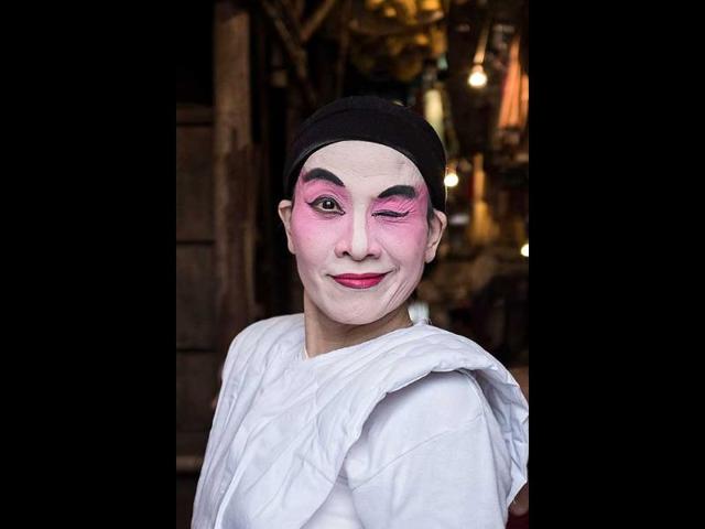 A Chinese Cantonese opera singer poses before her performance during the Tin Hau festival on Lamma Island, an outlying island of Hong Kong. Tin Hau, whose birthday is celebrated this year on April 22, is known as the Goddess of the Sea and maintains high popularity ratings amongst Hong Kongers (AFP Photo)