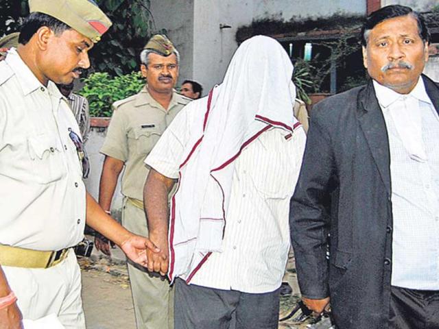 UP-Football-Association-s-secretary-general-Mohd-Shamsuddin-is-taken-away-by-cops-over-a-sexual-harrassment-charge-Madan-Mehrotra-HT-Photo UP-Football-Association-s-secretary-general-Mohd-Shamsuddin-is-taken-away-by-cops-over-a-sexual-harrassment-charge-Madan-Mehrotra-HT-Photo