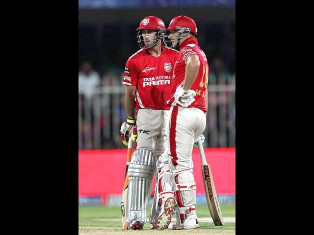 Kings XI Punjab players Glenn Maxwell and David Miller during their IPL 7 match against Sunrisers Hyderabad in Sharjah. (PTI Photo)