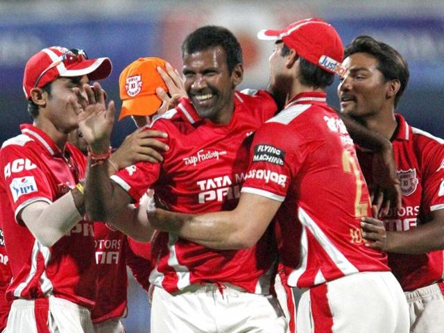 Lakshmipathy Balaji of Kings XI Punjab celebrates the wicket of David Warner of Sunrisers Hyderabad during their IPL 7 match in Sharjah. (PTI Photo)