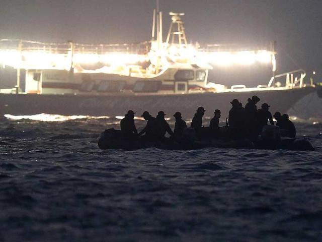 Migrants-arrive-on-a-boat-at-the-Sicilian-harbor-of-Pozzallo-Reuters