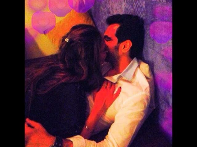 Esha Deol kisses hubby Bharat Takhtani.