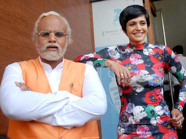 Bollywood actress Mandira Bedi and a Narendra Modi lookalike during promotion of the serial 'Gangs of Hasseepur' in Noida. (PTI photo)
