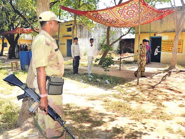 Two-voters-wait-their-turn-to-cast-vote-at-a-polling-booth-in-Bharatpur-district-HT-Photo Two-voters-wait-their-turn-to-cast-vote-at-a-polling-booth-in-Bharatpur-district-HT-Photo