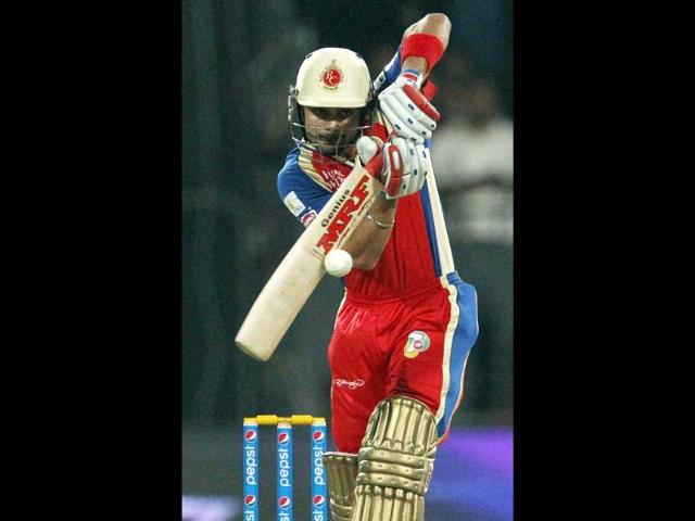 Virat Kohli, RCB captain plays a shot during an IPL 7 match against Kolkata Knight Riders in Sharjah. (PTI photo)