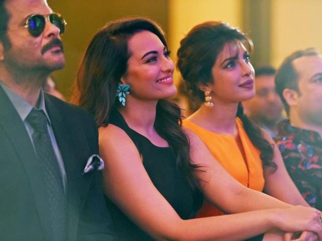 Anil Kapoor, Sonakshi Sinha and Priyanka Chopra listen to an address during a press conference at IIFA awards. (AFP)