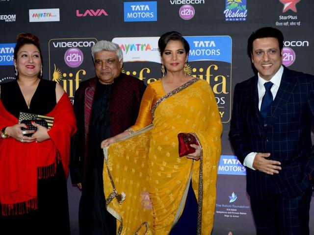 Javed Akhtar and Shabana Azmi pose with Govinda and his wife, Sunita on the green carpet at the Tampa Convention Center ahead of IIFA Rocks on the second day of IIFA awards. (AFP)