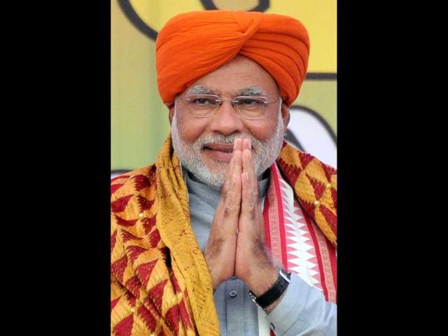 BJP prime ministerial candidate Narendra Modi speaks during an election rally in Hoshairpur. (AFP photo)