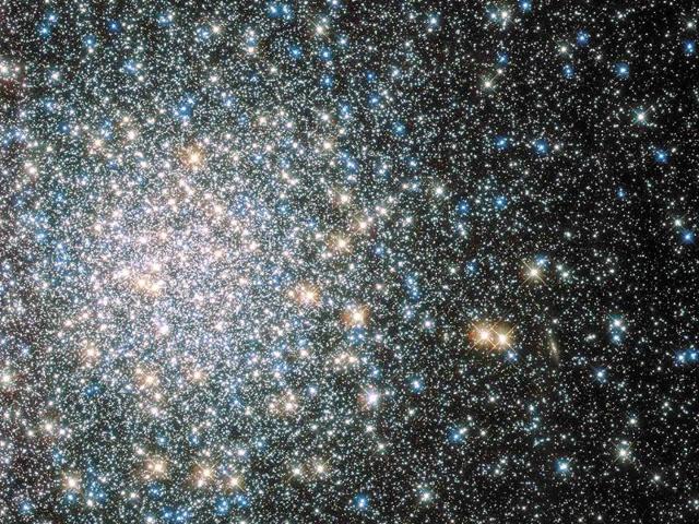 A globular star cluster called Messier 5 (M5) containing 100,000 stars or more and packed into a region around 165 light-years in diameter is seen by NASA's Hubble Space telescope. (Reuters photo)