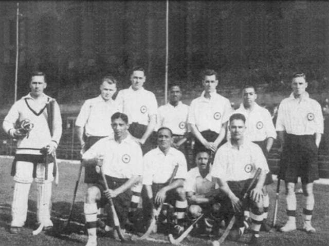 Gold rush: The Dhyan Chand legend was built upon consistent performances. He was part of the gold medal winning hockey contingent in three successive Olympics. Here he poses with the victorious 1928 team which became champions at Amsterdam.