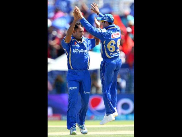 Stuart Binney of Rajasthan Royals celebrates the wicket of Yogesh Takawale of Royal Challengers Bangalore during during their IPL 7 match in Abu Dhabi. (PTI Photo)
