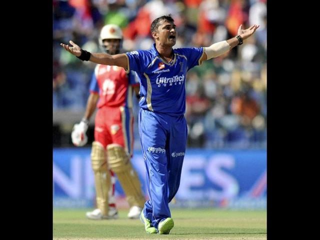 Pravin Tambe of Rajatshan Royals appeals successfully for the wicket of Ashoke Dinda of Royal Challengers Bangalore during their IPL 7 match in Abu Dhabi. (PTI Photo)