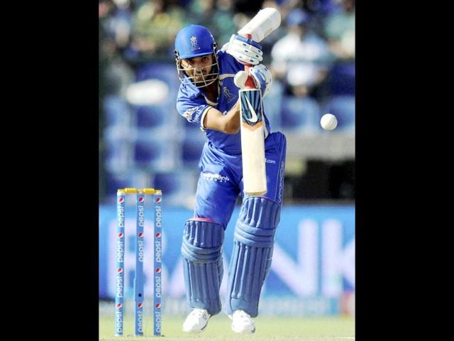 Rajatshan Royals' Ajinkya Rahane plays a shot during their IPL 7 match against Royal Challengers Bangalore in Abu Dhabi. (PTI Photo)