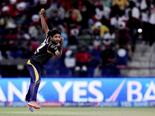 Piyush Chawla of Kolkata Knight Riders bowls during their IPL7 match against Kings X1 Punjab in Abu Dhabi. (PTI Photo)