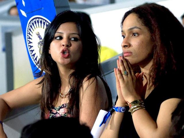 Sakshi, MS Dhoni's wife and Masaba Gupta, fashion designer watch an IPL 7 match in Sharjah. (PTI Photo)