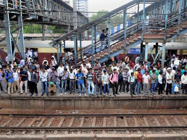 Commuters-crowd-onto-a-platform-as-they-wait-for-a-train-at-a-station-on-the-suburban-train-network-in-Mumbai-AFP-photo Commuters-crowd-onto-a-platform-as-they-wait-for-a-train-at-a-station-on-the-suburban-train-network-in-Mumbai-AFP-photo