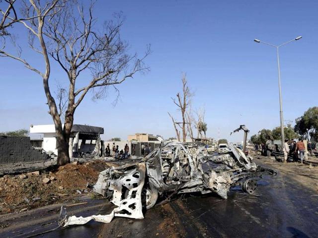 A-damaged-army-vehicle-is-seen-after-after-a-suicide-bombing-at-an-army-camp-in-Benghazi-April-29-2014-Reuters-Photo