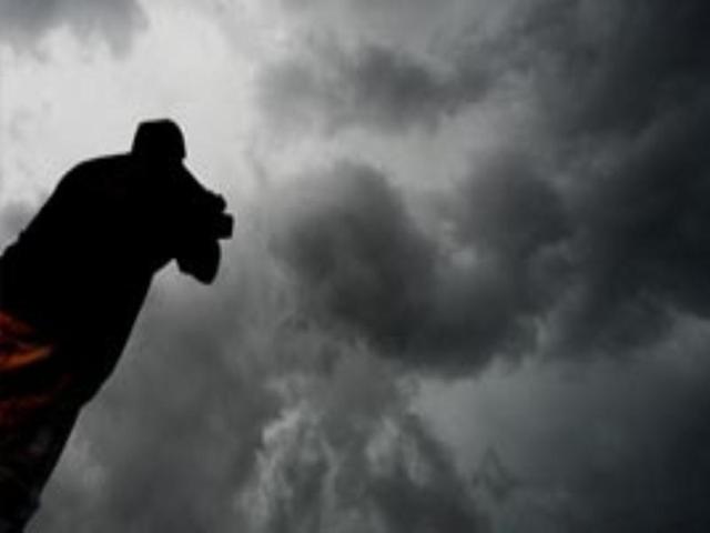 Storm chaser video photographer Brad Mac films rotating clouds from a tornado storm in Louisville, Mississippi in on a second day of ferocious storms. (Reuters Photo)