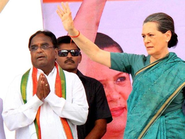 Congress president Sonia Gandhi waves at an election meeting at Chevella near Hyderabad. (PTI photo)
