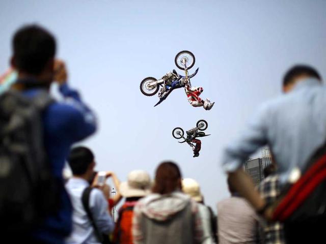 Competitors perform at the FMX Course competition during the World Extreme Games in Shanghai. (Reuters)
