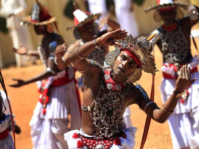 Prisoners who underwent Sri Lankan traditional dance training perform during their "graduation ceremony" at Welikada Prison in Colombo. (Reuters)