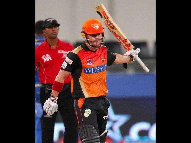 David Warner of Sunrisers Hyderabad celebrates his fifty during their IPL 7 match against Mumbai Indians in Dubai. (PTI Photo)