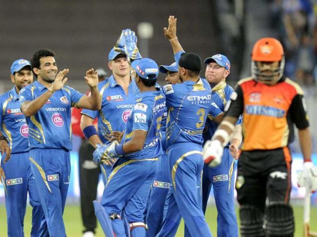 Zaheer Khan of Mumbai Indians celebrates the wicket of Shikhar Dhawan of Sunrisers Hyderabad during their IPL 7 match in Dubai. (PTI Photo)