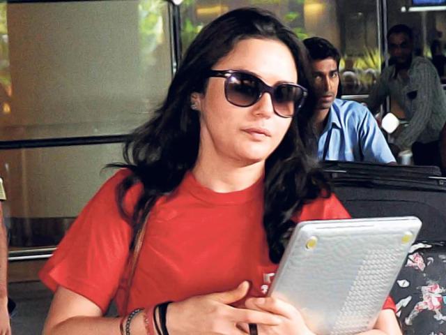 Actor Preity Zinta, who is busy with the IPL, was seen returning to the city after the overseas leg of the tournament. (HT PHOTO)
