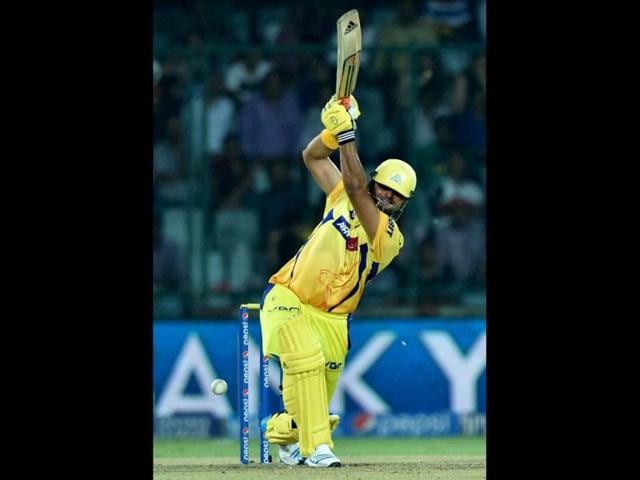 Chennai Super Kings batsman Suresh Raina plays a shot against Delhi Daredevils during their IPL 7 match at Ferozshah Kotla, in New Delhi. (PTI Photo)
