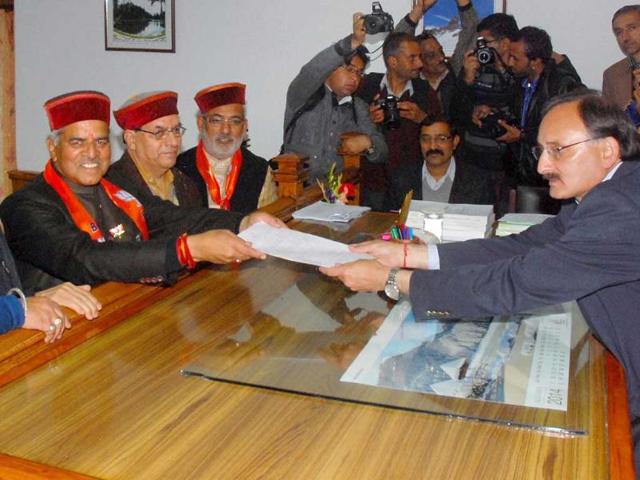 BJP candidate Virender Kashyap with party leaders files his nomination papers in Shimla. (PTI Photo) BJP candidate Virender Kashyap with party leaders files his nomination papers in Shimla. (PTI Photo)