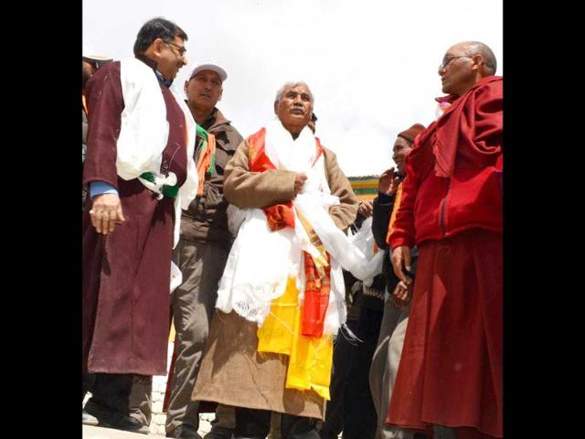 BJP candidate Thupstan Chhewang with Tarun Vijay on their way to file nomination papers in Leh. (PTI Photo) BJP candidate Thupstan Chhewang with Tarun Vijay on their way to file nomination papers in Leh. (PTI Photo)