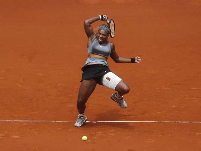 Serena Williams from US returns the ball to Shuai Peng from China during Madrid Open tennis tournament match in Madrid, Spain. (AP Photo)