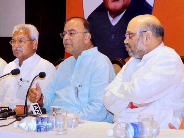 BJP-leader-Arun-Jaitley-with-party-leaders-Amit-Shah-and-Laxmikant-Bajpai-addresses-a-press-conference-in-Varanasi-PTI-photo BJP-leader-Arun-Jaitley-with-party-leaders-Amit-Shah-and-Laxmikant-Bajpai-addresses-a-press-conference-in-Varanasi-PTI-photo