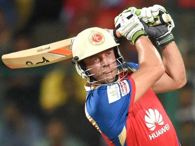 Royal Challengers Bangalore's AB De Villiers plays a shot during their IPL 7 match against King’s XI Punjab at Chinnaswamy Stadium in Bangalore. (PTI Photo)