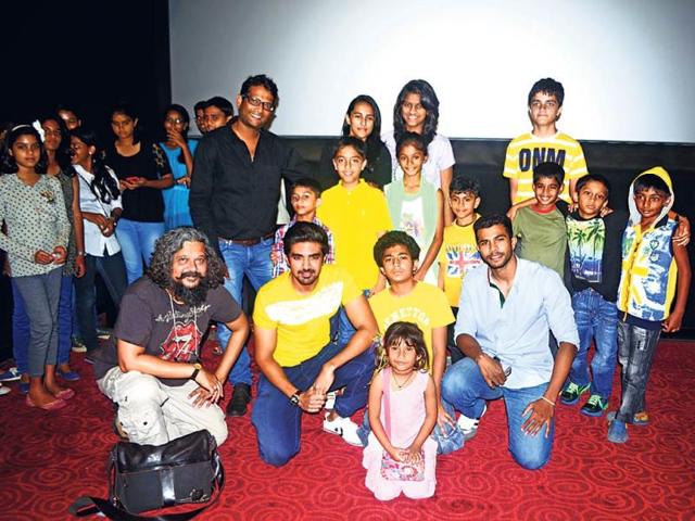 Film-maker Amole Gupte, actors Saqib Saleem and Partho Gupte, and skater Nikhilesh Tabhane (seated) with other skaters were at a movie screening.