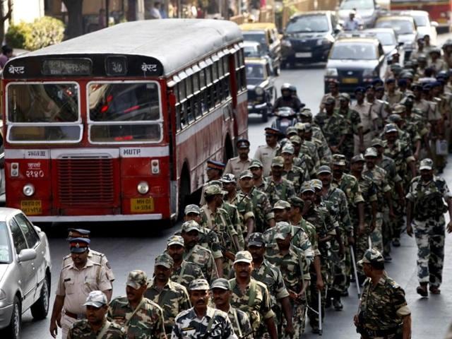 CISF personnel during a flag march ahead of the Lok Sabha elections at Prabhadevi in Mumbai. (HT photo/Kunal Patil)