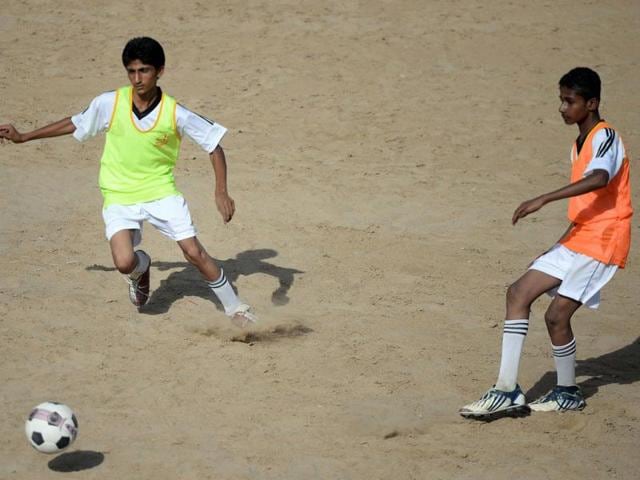 Pakistani local youth participate in a training session at a local stadium in Karachi. (AFP Photo)