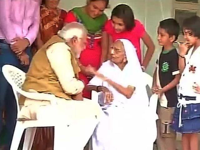 BJP-s-PM-candidate-Narendra-Modi-taking-his-mother-Hiraba-s-blessings-in-Gandhinagar-ANI-photo