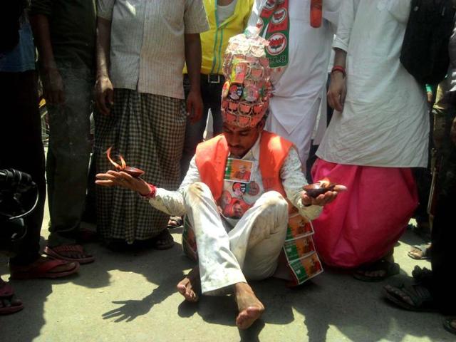 BJP-supporters-paint-the-town-red-with-their-celebrations-almost-literally-Raj-K-Raj-HT-Photo BJP-supporters-paint-the-town-red-with-their-celebrations-almost-literally-Raj-K-Raj-HT-Photo