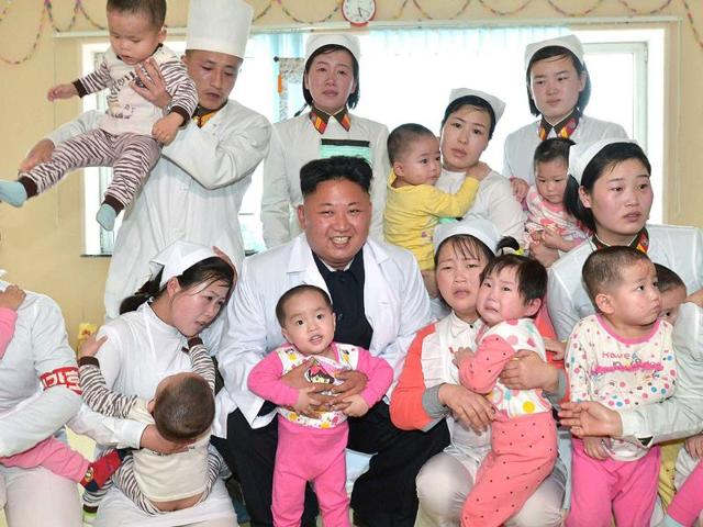 North Korean leader Kim Jong Un smiles during a visit to Taesongsan General Hospital in this undated photo released by North Korea's Korean Central News Agency (KCNA) in Pyongyang. (Reuters)