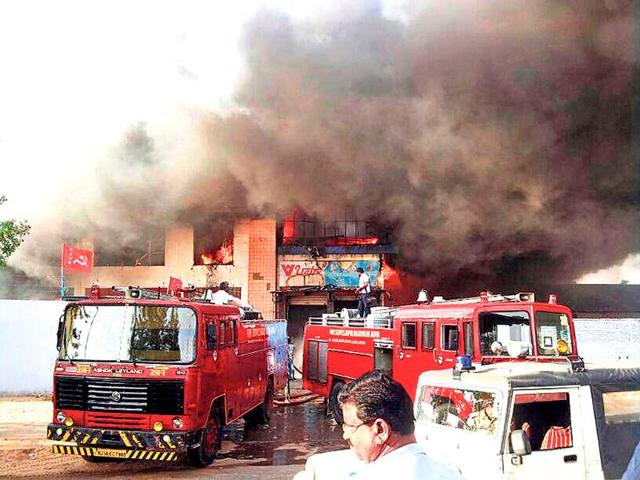 Firefighters-douse-the-flames-at-an-industrial-unit-that-caught-fire-in-Malviya-Nagar-area-of-Jaipur-on-Monday-HT-Photo